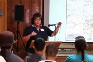 Nevada County Environmental Health Director Amy Irani speaks to volunteers as part of pre-posting training on July 11, 2015